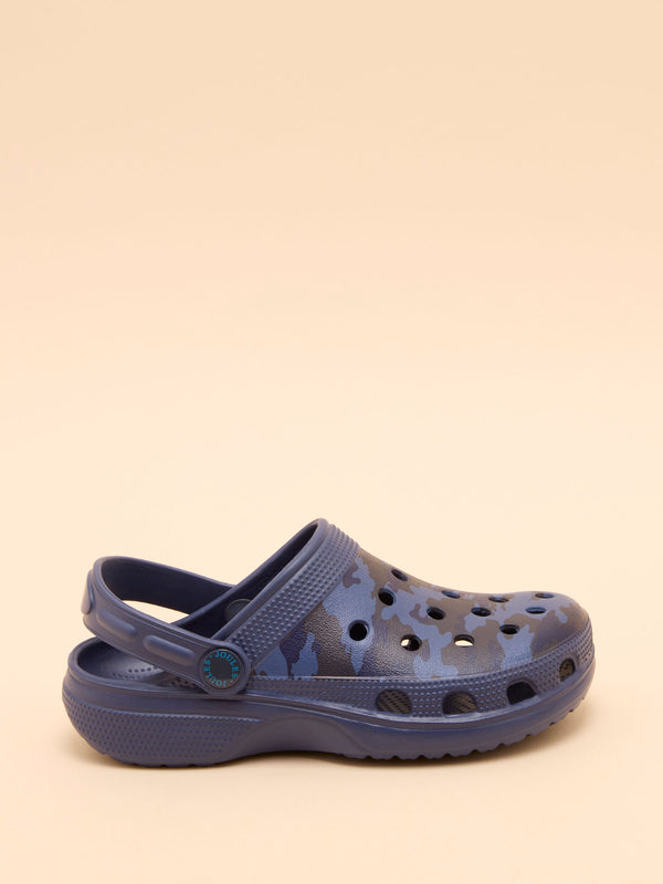 Navy blue sandal with a pattern on a beige background