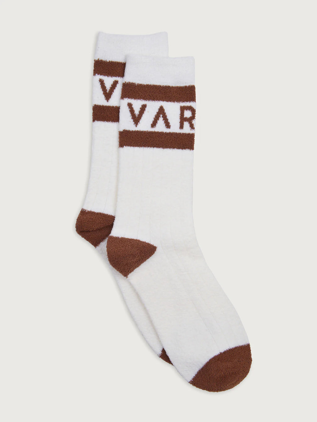 White socks with brown accents and 'VARLEY' branding on a light gray background