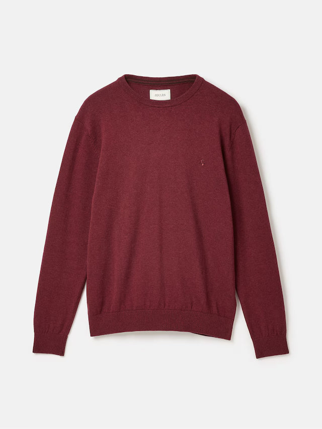Maroon sweater on a light gray background