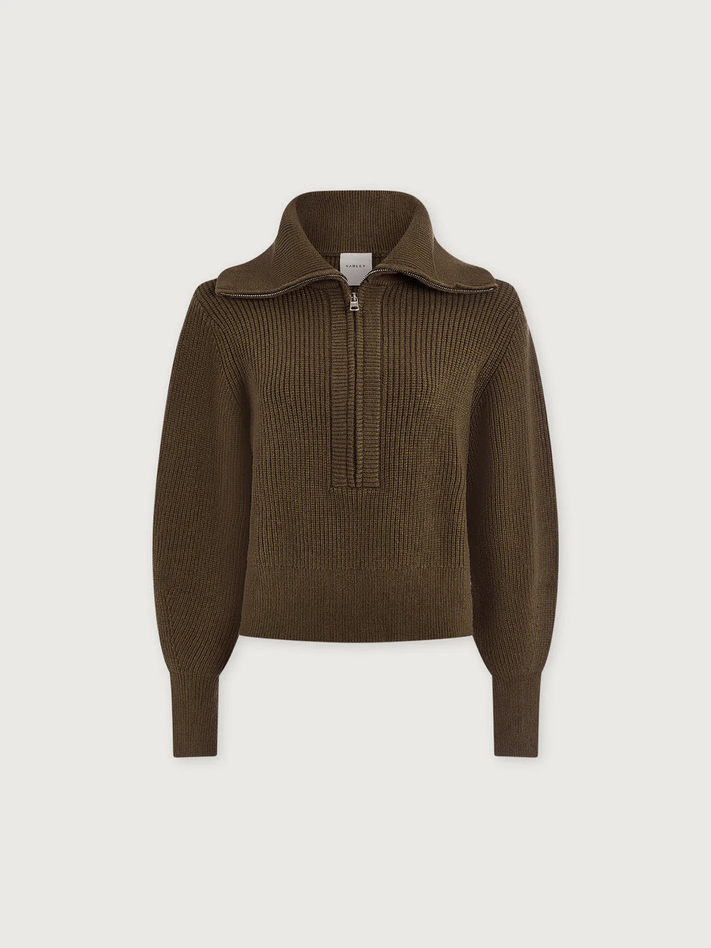 Brown ribbed knit sweater with a quarter zip on a light beige background