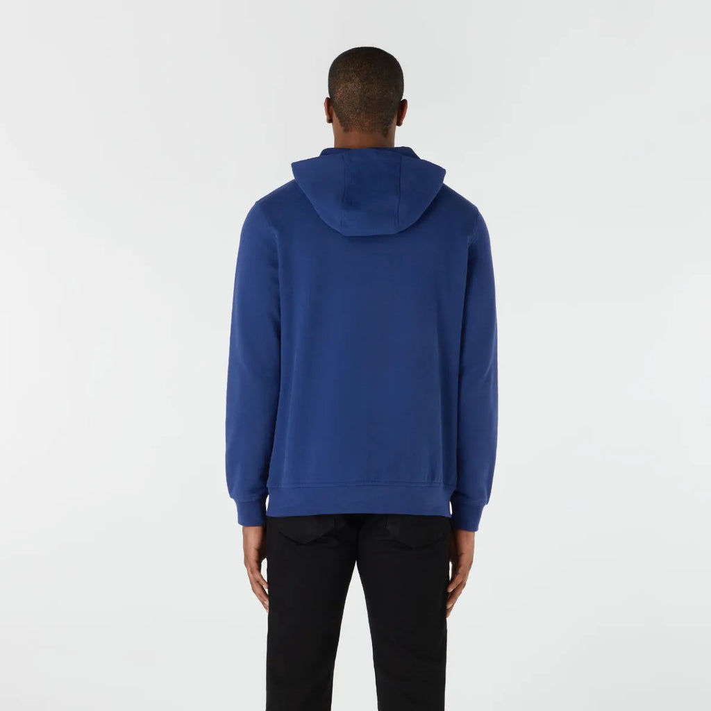 Person wearing a blue hoodie on a white background