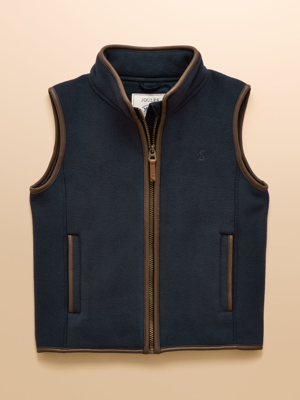Navy blue vest with brown trim on a beige background