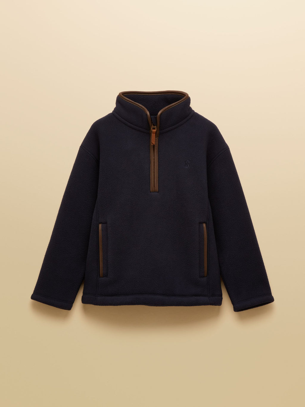 Navy fleece pullover with brown accents on a beige background