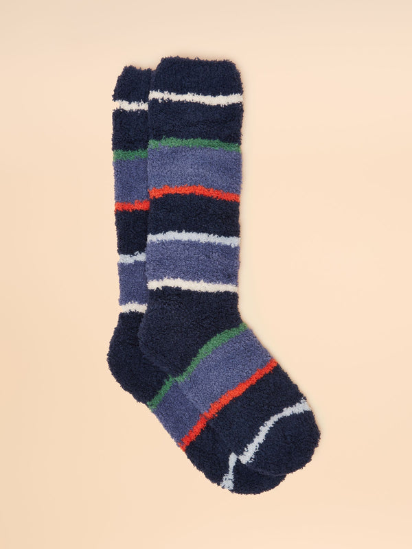 Striped socks with blue, green, and red colors on a beige background