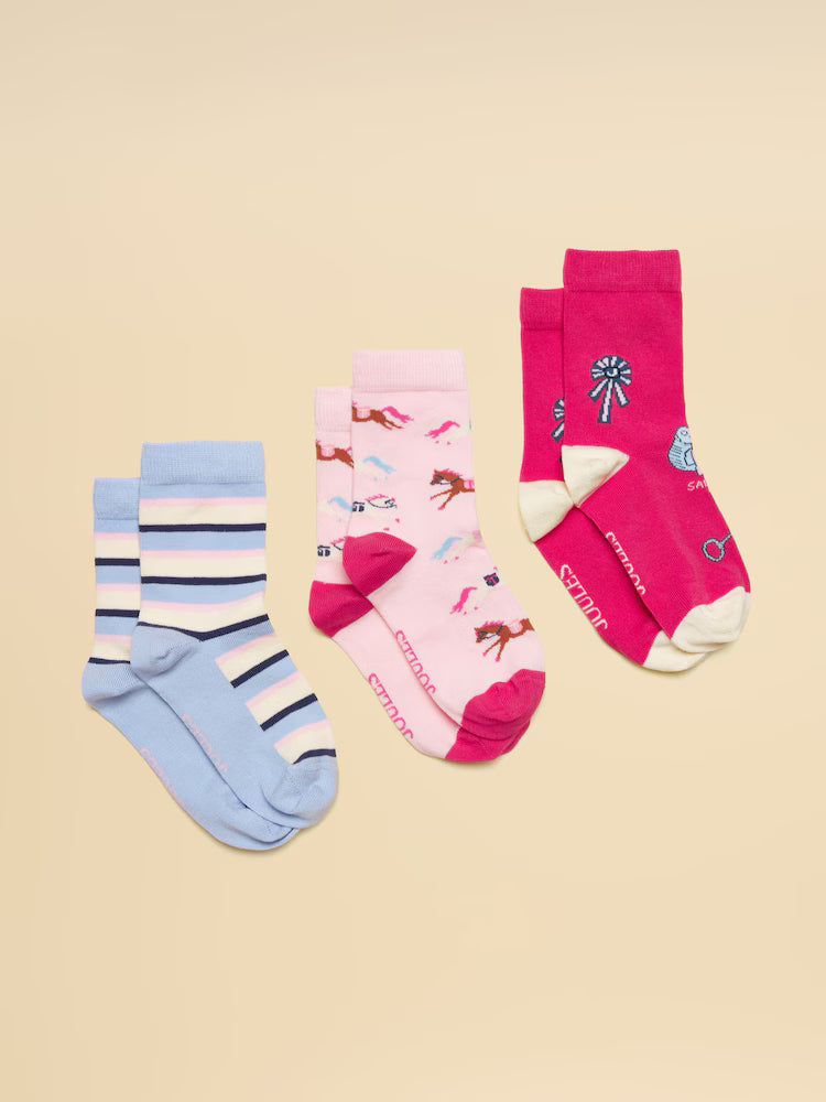 Set of colorful socks with various patterns on a beige background
