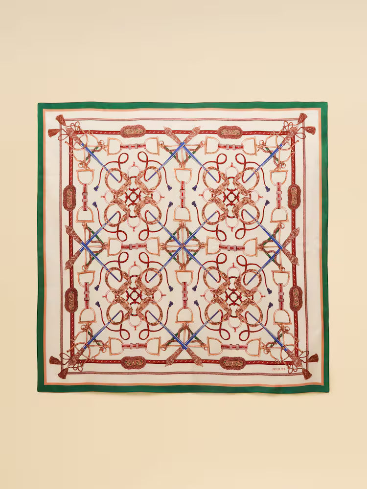 Decorative scarf with intricate patterns on a beige background
