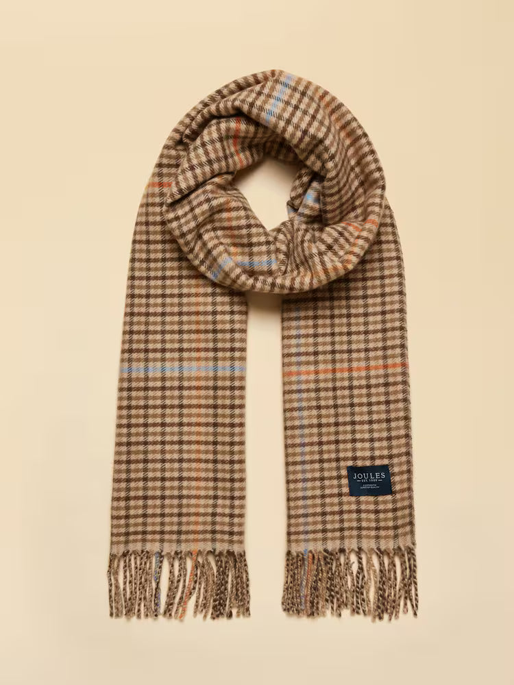 Plaid scarf with fringes on a beige background