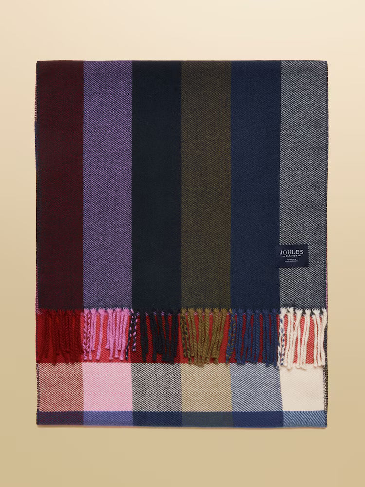 Plaid scarf with colorful stripes on a beige background