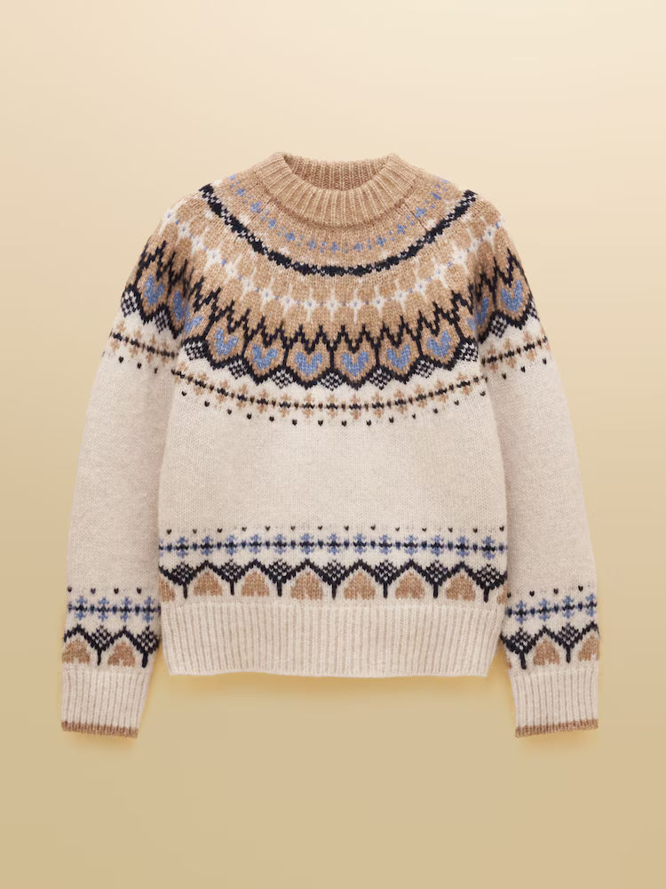 Knitted sweater with a pattern on a beige background