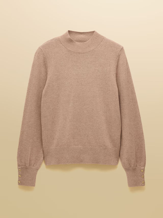 Brown sweater on a beige background