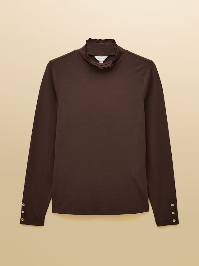 Brown long-sleeve top with ruffled collar on a beige background