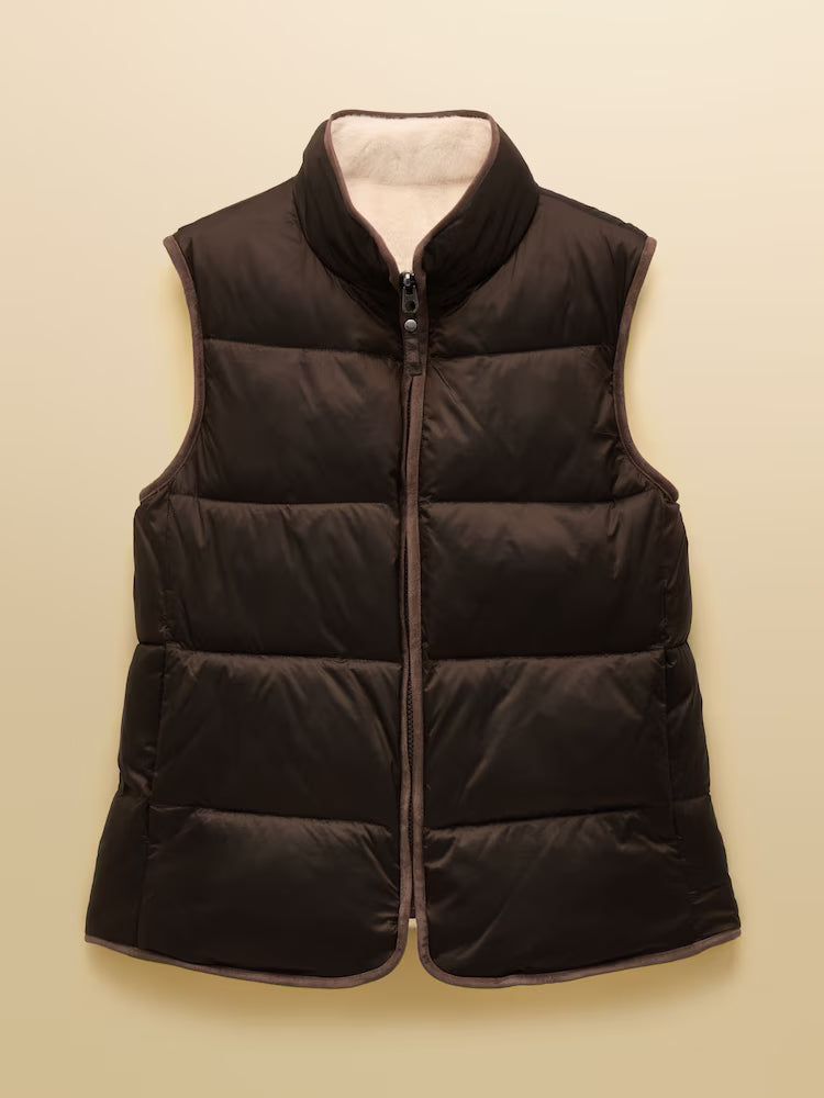 Brown padded gilet on a yellow background