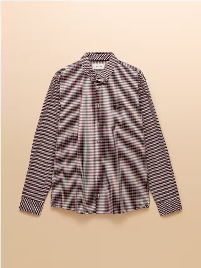 Checkered shirt on a beige background