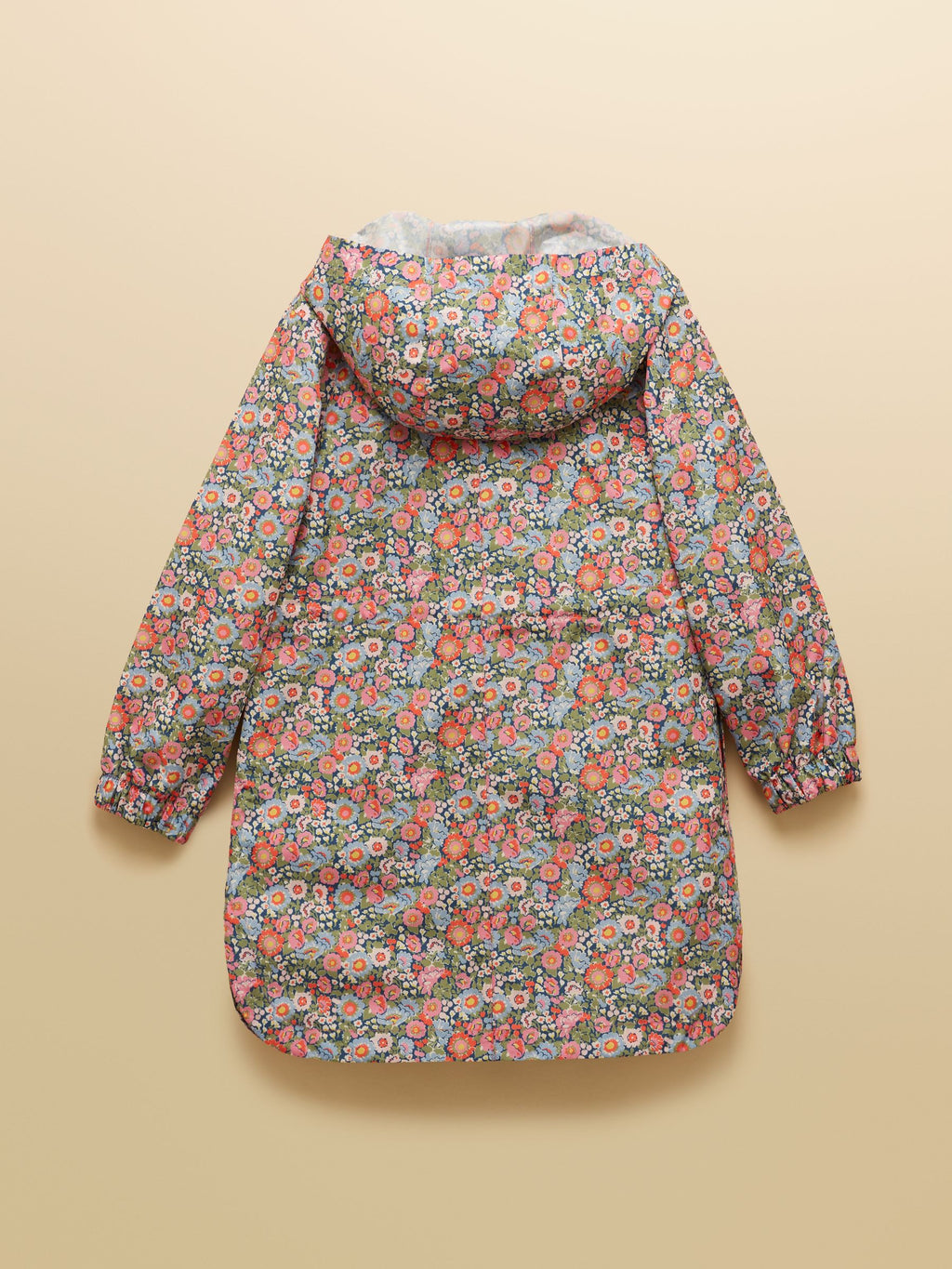 Floral patterned jacket on a beige background