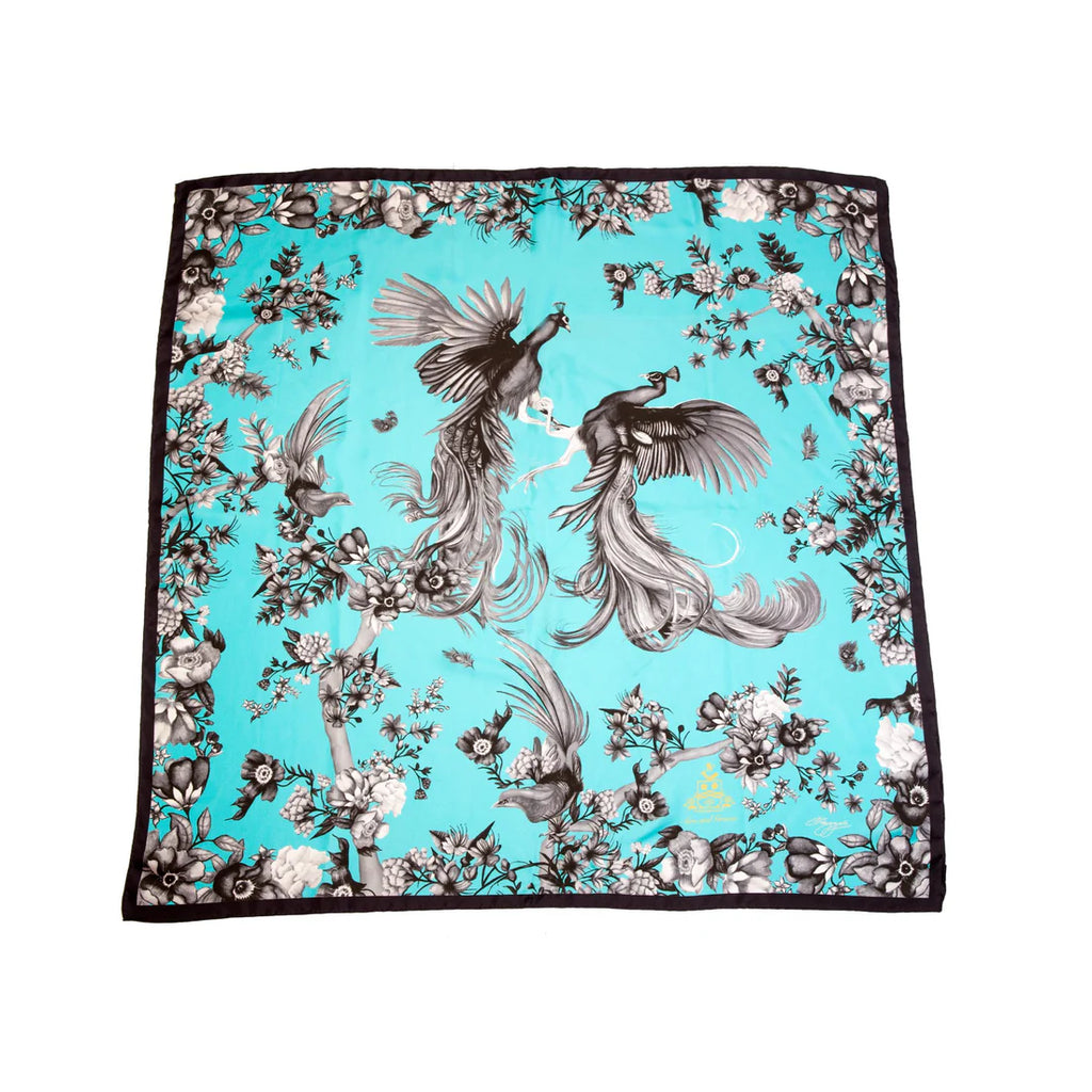 Scarf with peacock and floral design on a turquoise background