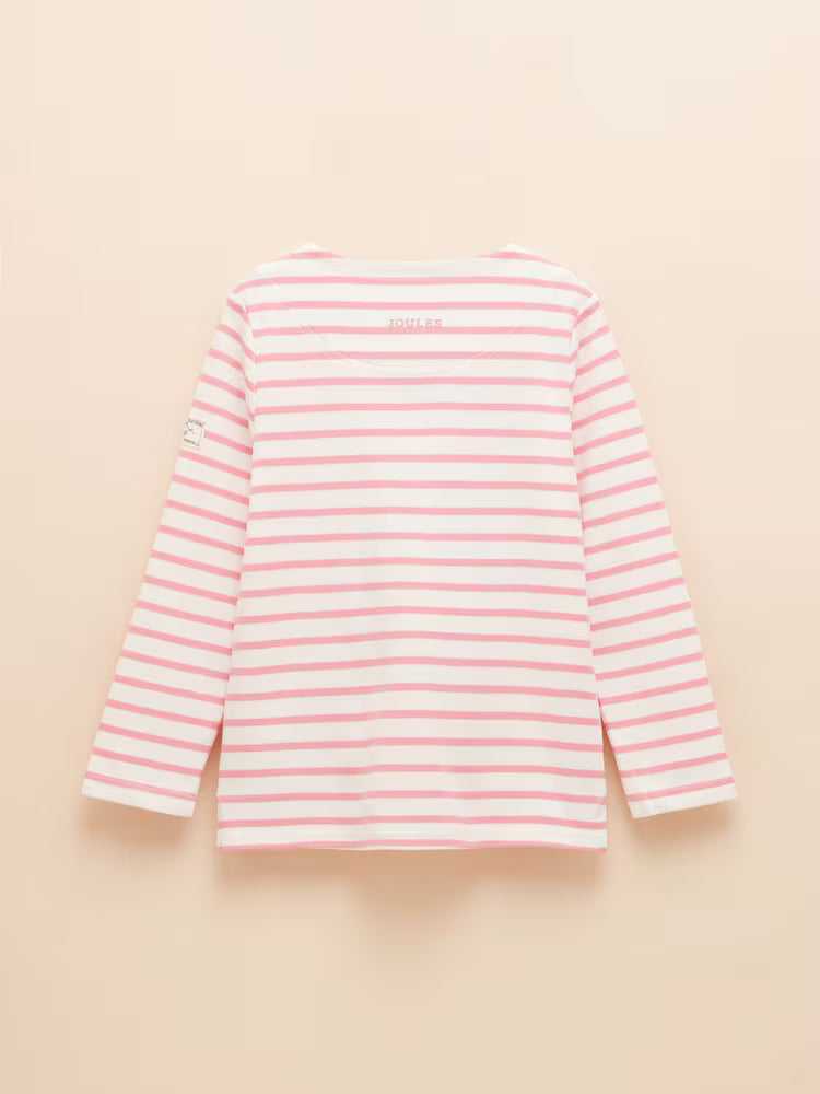 A children's sized pink and white striped long sleeve top on a yellow background