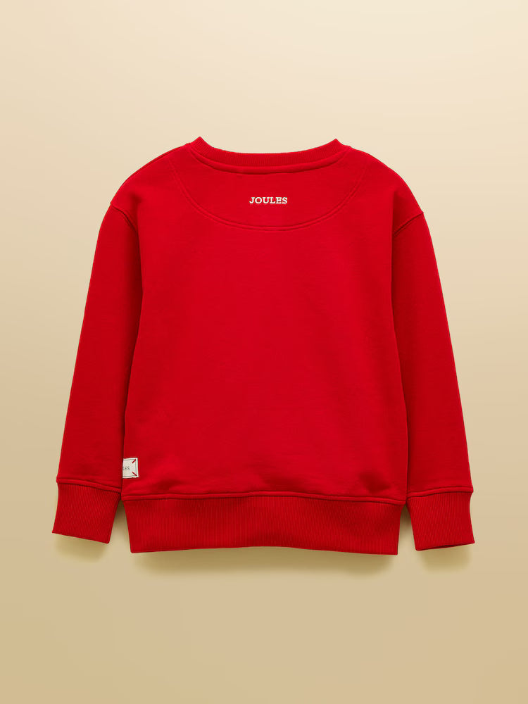 Red sweatshirt with 'Joules' branding on a beige background