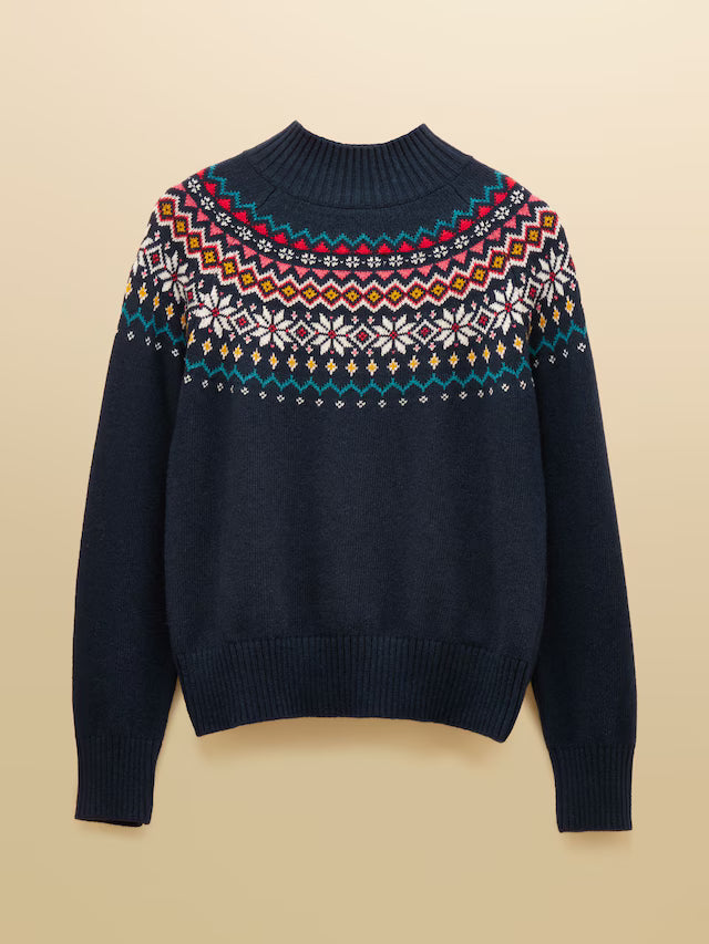 Navy sweater with colorful pattern on a beige background