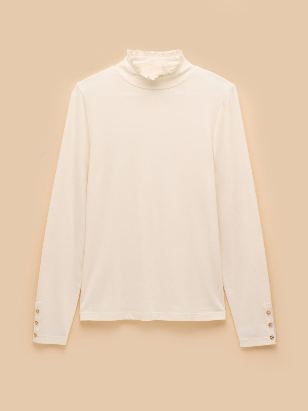 White long-sleeve shirt with a high collar on a beige background