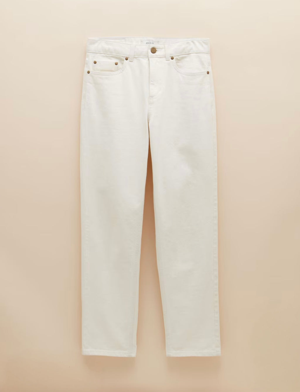 White jeans on a beige background