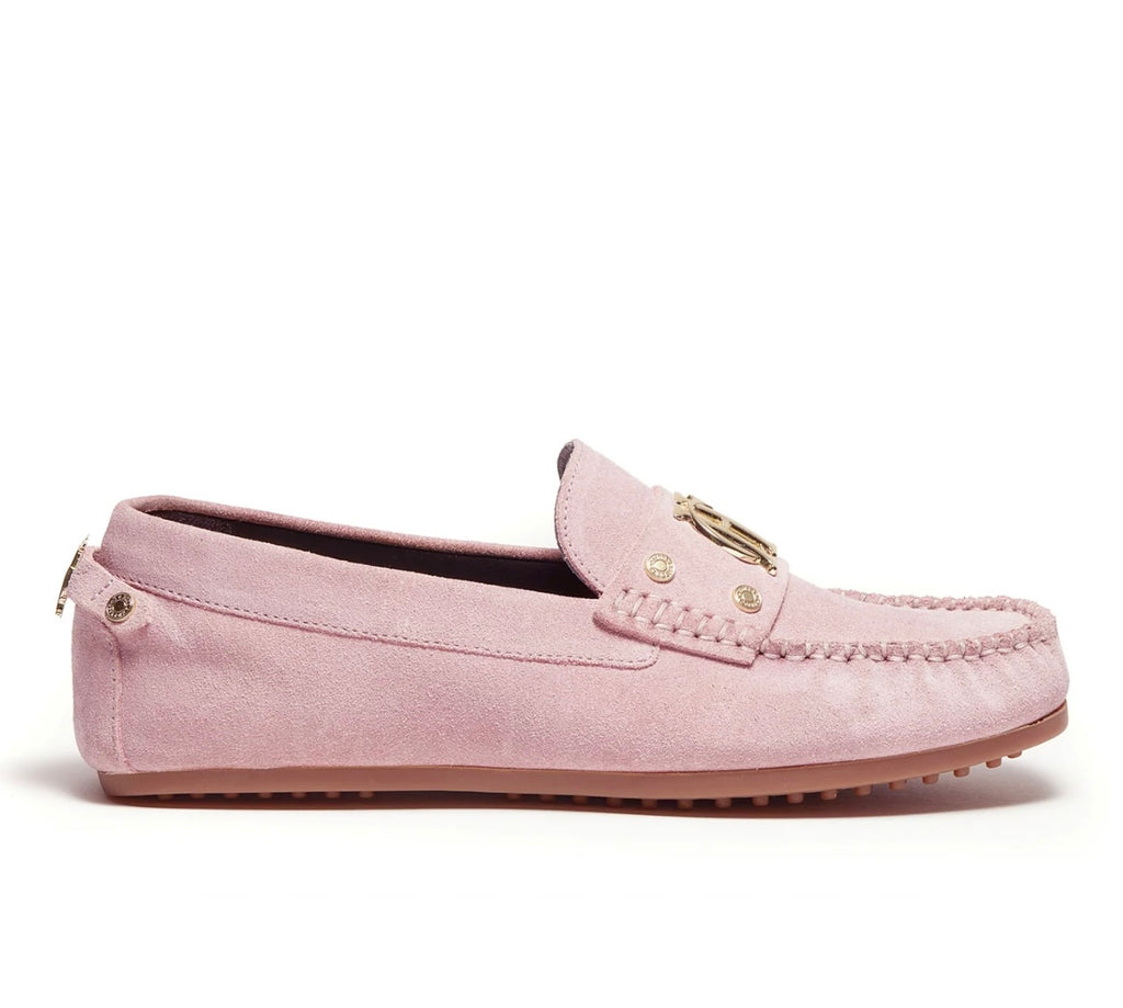 Pink loafer shoe on a white background