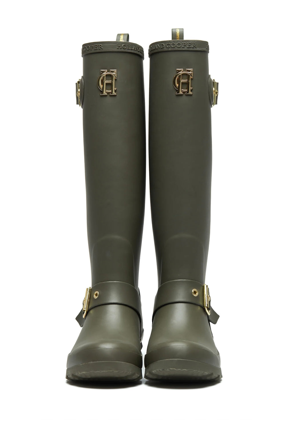 Pair of green rubber boots with buckles on a white background