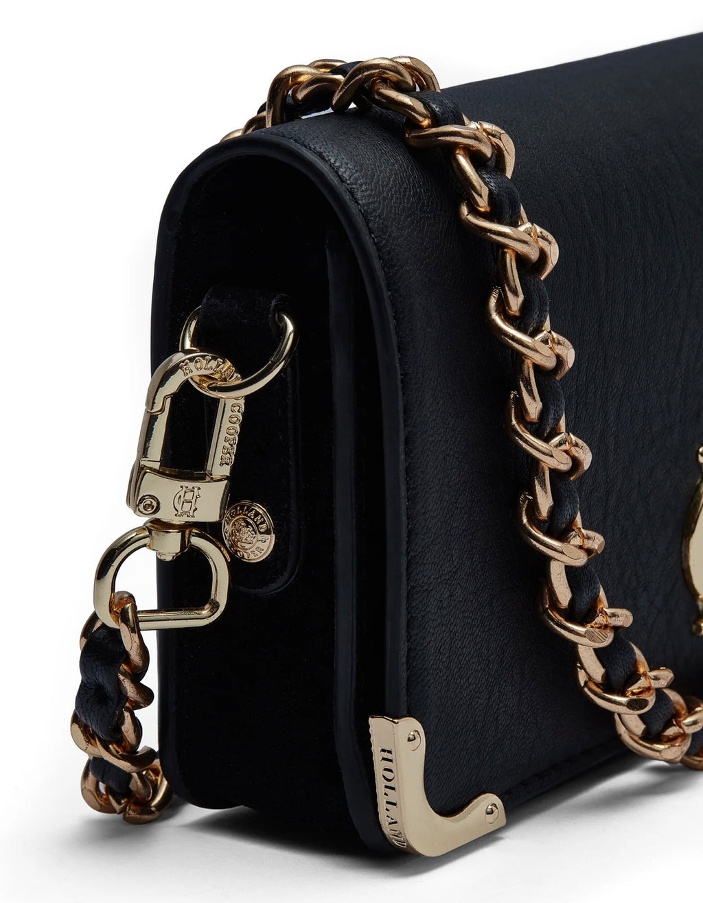 Black handbag with gold chain strap on a white background