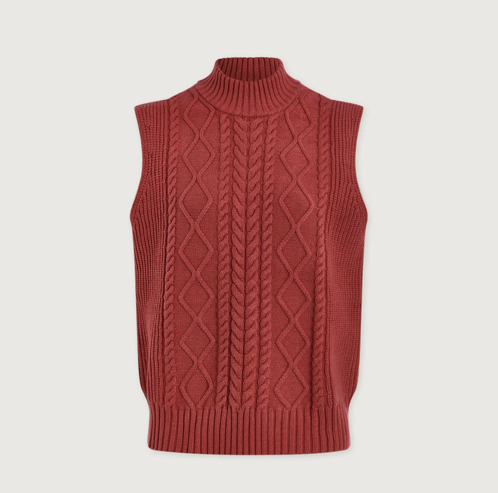 Brown knitted vest with a pattern on a light gray background