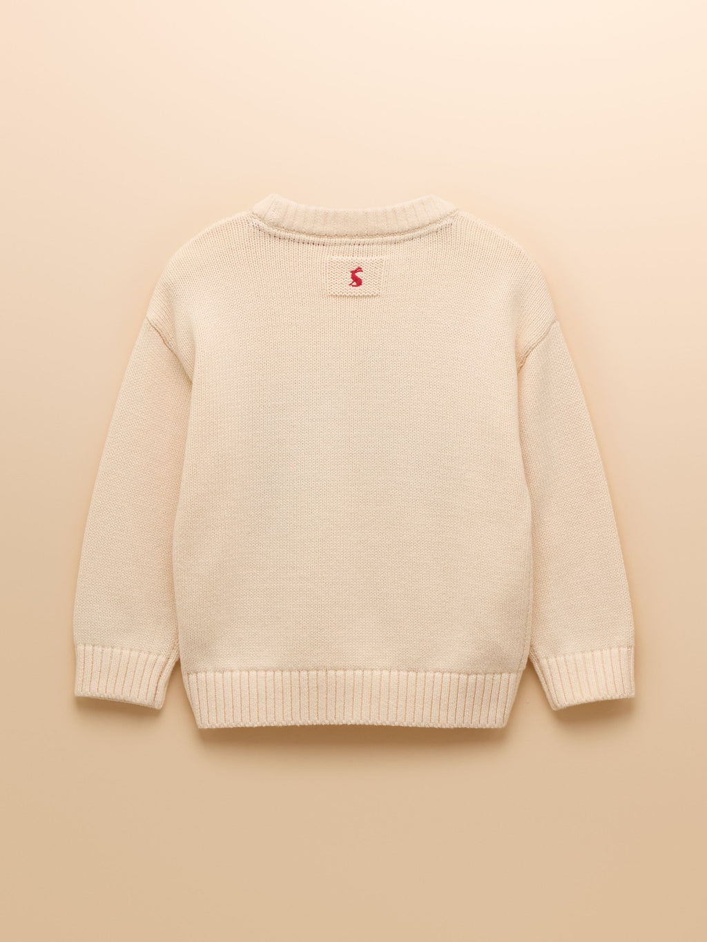 Beige sweater on a beige background