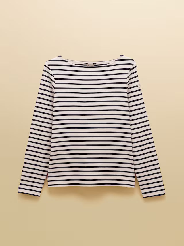 Black and white striped long-sleeve shirt on a beige background