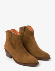 Pair of brown suede ankle boots on a white background