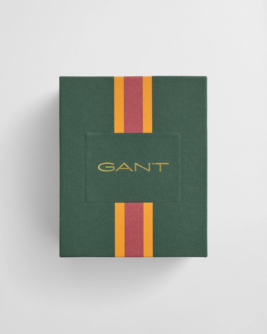 Green GANT box with red and yellow stripes on a light gray background