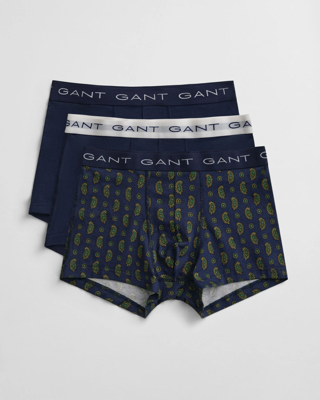 Three pairs of GANT boxer briefs on a light gray background